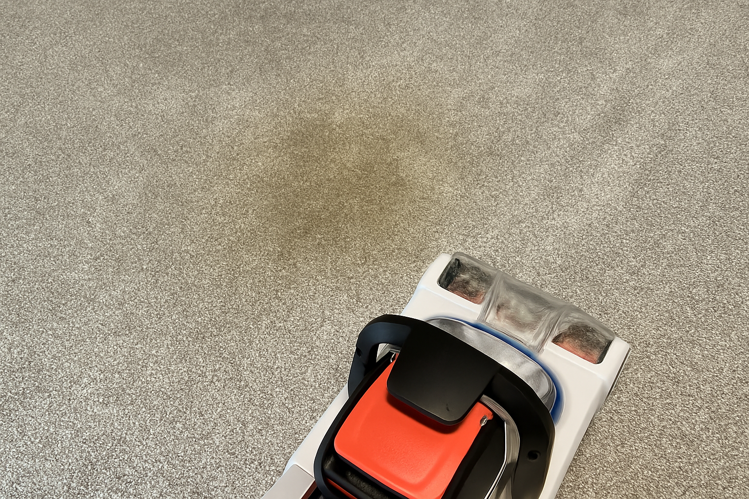 Using Hoover PowerDash Pet carpet cleaner on a stained carpet near a sofa